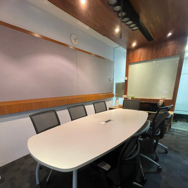 Premium Conference Room Rental – 7-Pax, Air-Conditioned with Projector